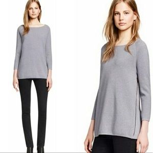 Tory Burch side zip sweater in black.